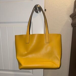 Used reversible, large tote. Yellow and Navy Floral
